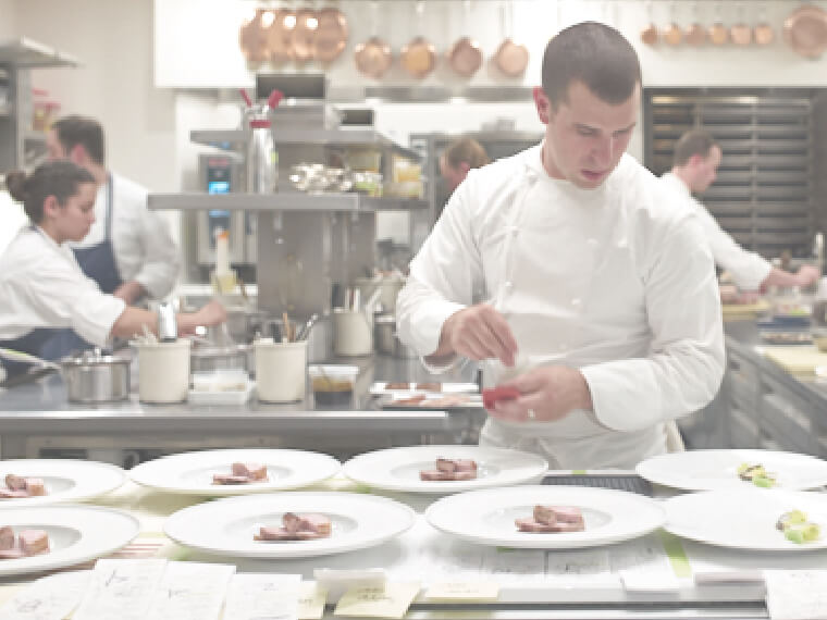 Cook preparing meal